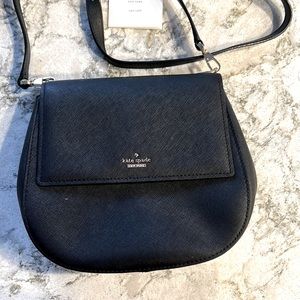 Never used black KATE SPADE (hard) leather crossbody handbag. Clean. No problems